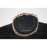A 9ct gold curb link bracelet 10.4 grams