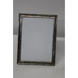A large Sterling Silver hallmarked photo frame 24x18cm