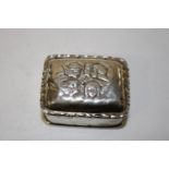 An antique hallmarked silver snuff/pill box