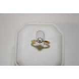 An 18ct gold & diamond solitaire ring size K 1/4