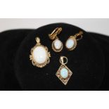 Two 9ct gold opal pendants & a pair of 9ct gold & opal earrings