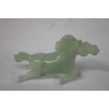 A carved green jade horse