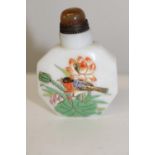A hand painted & signed scent bottle