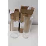 Four new boxed glass vases