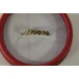 A 9ct gold half eternity ring size P