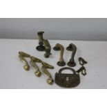 A selection of vintage brass door handles, and door knocker etc