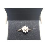A 9ct gold & diamond flower cluster ring size K