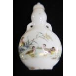 A hand painted porcelain scent bottle 8cm