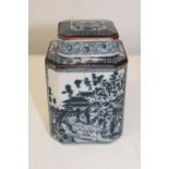 A vintage ceramic tea caddy