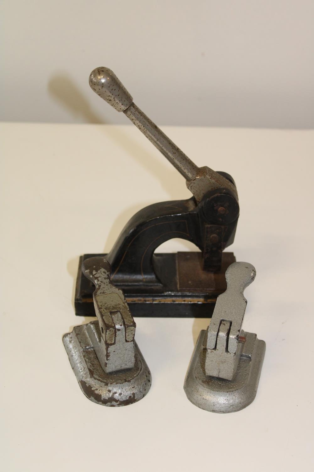 Three heavy vintage hole punchers