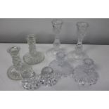 A selection of glass candlesticks