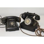 Two vintage bakelite telephones (at fault)
