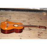 A cased acoustic guitar (needs re-stringing) Collection Only