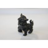 A small bronze foe dog 3.5cm x 4cm