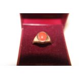 A 9ct gold & red stone ring 3.4 grams total