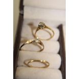 Two 18ct gold rings & one 9ct gold ring (18ct gold weight 2.6 grams total 9ct gold weight 1.0 gram.)