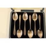 A cased set of six hallmarked silver teaspoons 61.3 grams