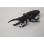A bronze Rhino beetle. 8cm