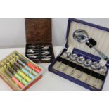 A selection of vintage boxed cutlery
