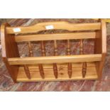 A vintage pine magazine rack