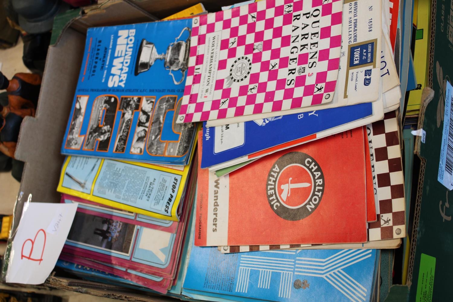 A box full of vintage football programmes from the 1960's & 70's