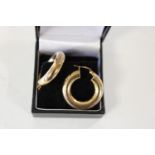A pair of 9ct gold hoop earrings 3.6 grams