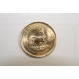 A 1998 gold 1/10 oz South African Kruggerand 3.5 gms UNC