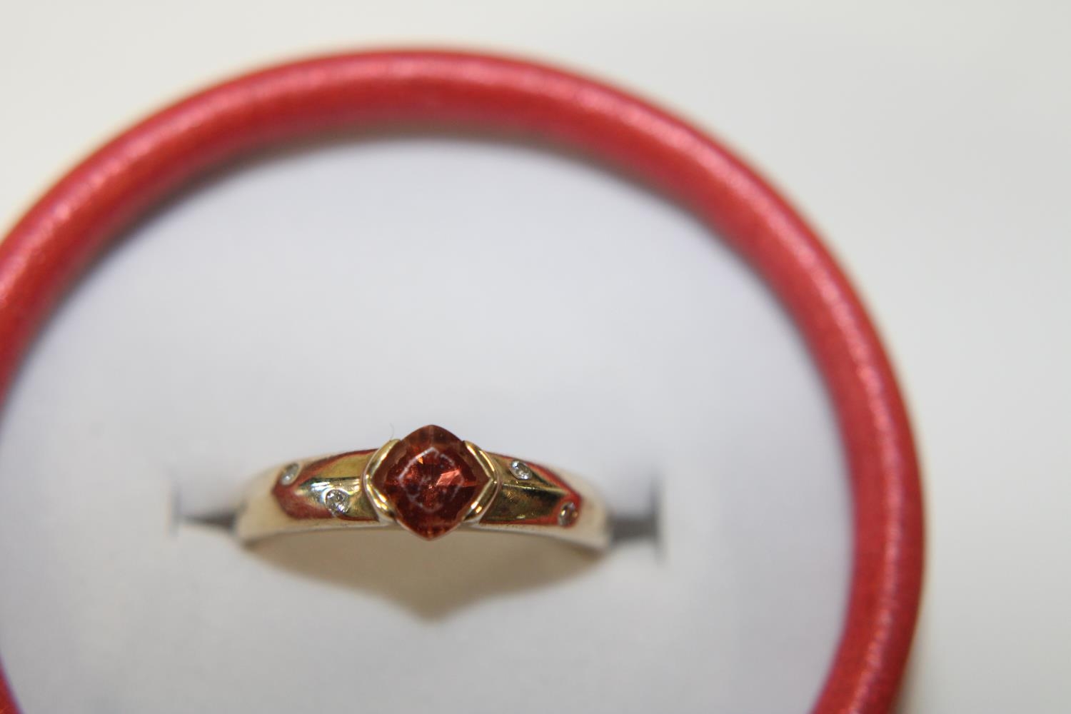 A 9ct gold diamond & orange stone ring size N 1/2