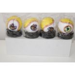 A set of four Beatles "Yellow Submarine" baseballs