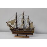 A well made wooden model ship 'HMS Resolution' 44cm x 48cm