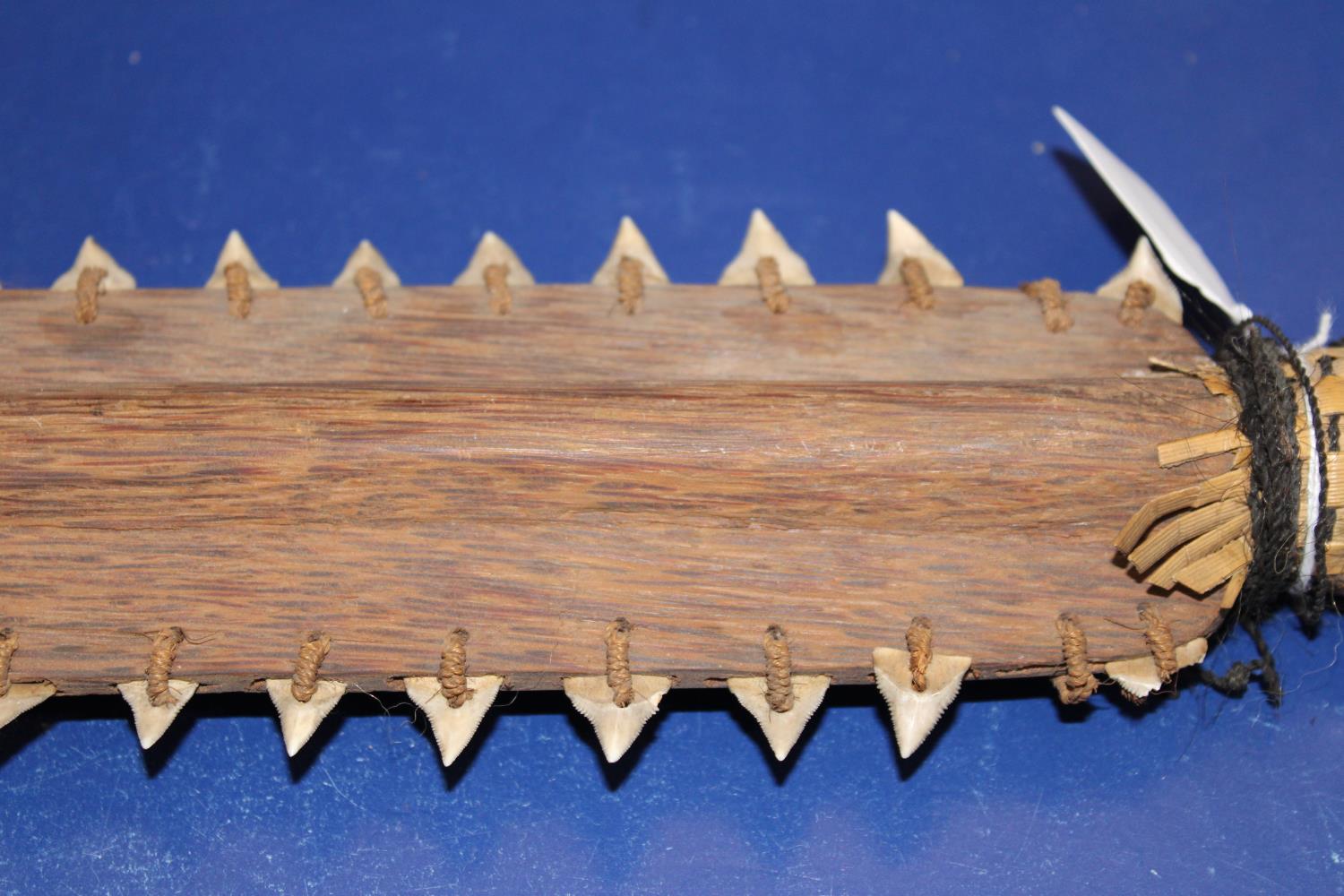 An unusual tribal club, with sharks teeth on both sides, possibly Moari or Polynesian. 54cm in - Image 3 of 4