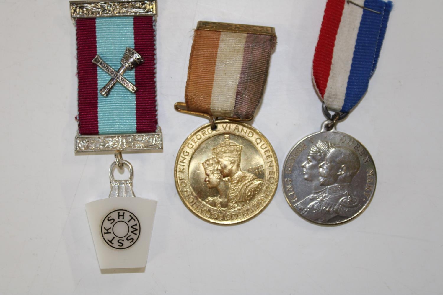 Three assorted medals