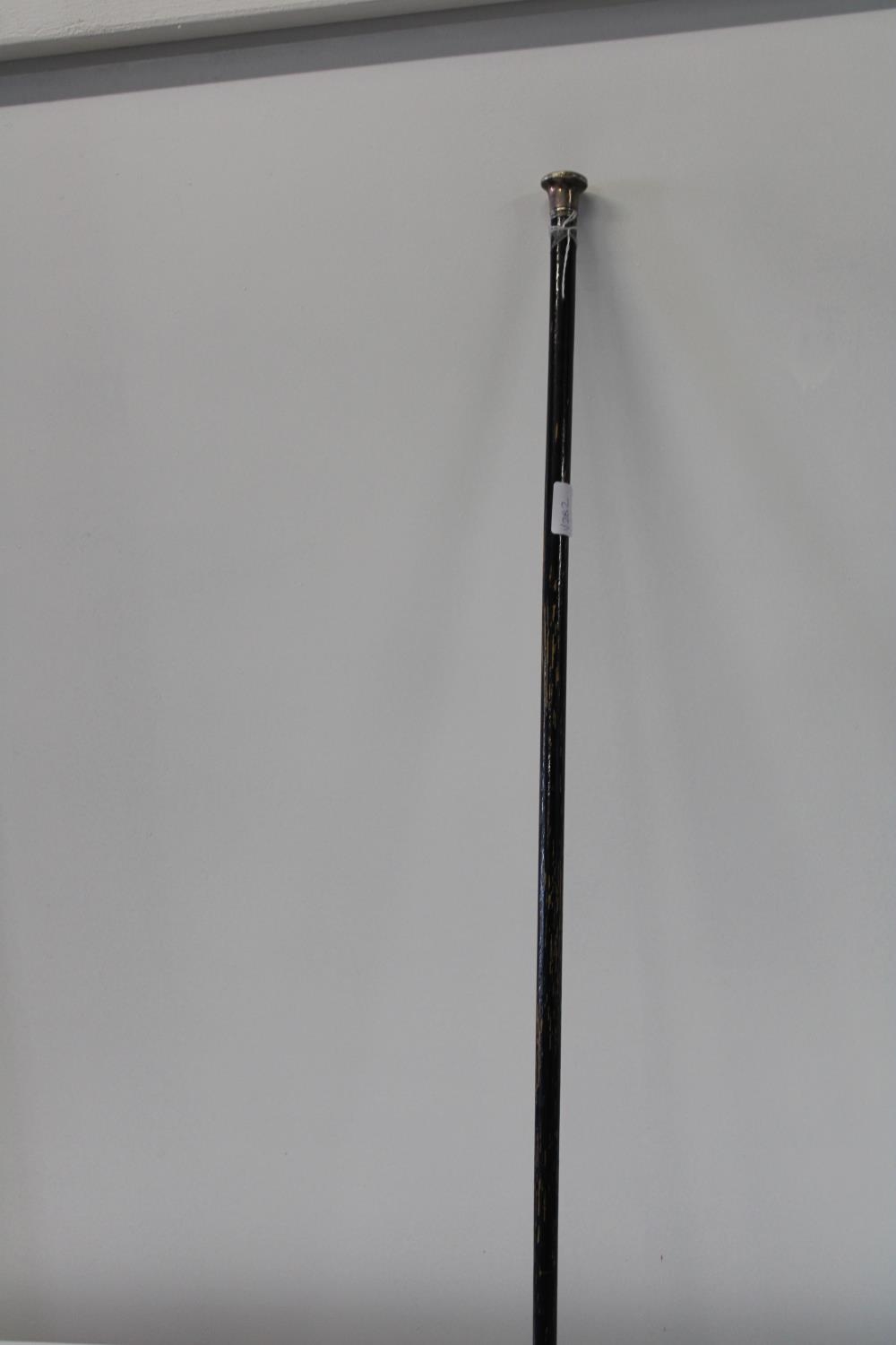 A Sterling silver topped ebonised walking stick 92cm in length