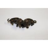 A small pair of joined bronze Dachshund's 5cm long