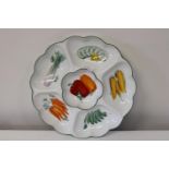 A Royal Worcester vegetable plate 34cm in dia