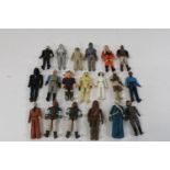 A selection of vintage Star Wars figures, from the 70's & 80's