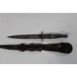 A WW2 pattern 3 Fairbairn Sykes Commando fighting knife with faint markings to the pommel and in the