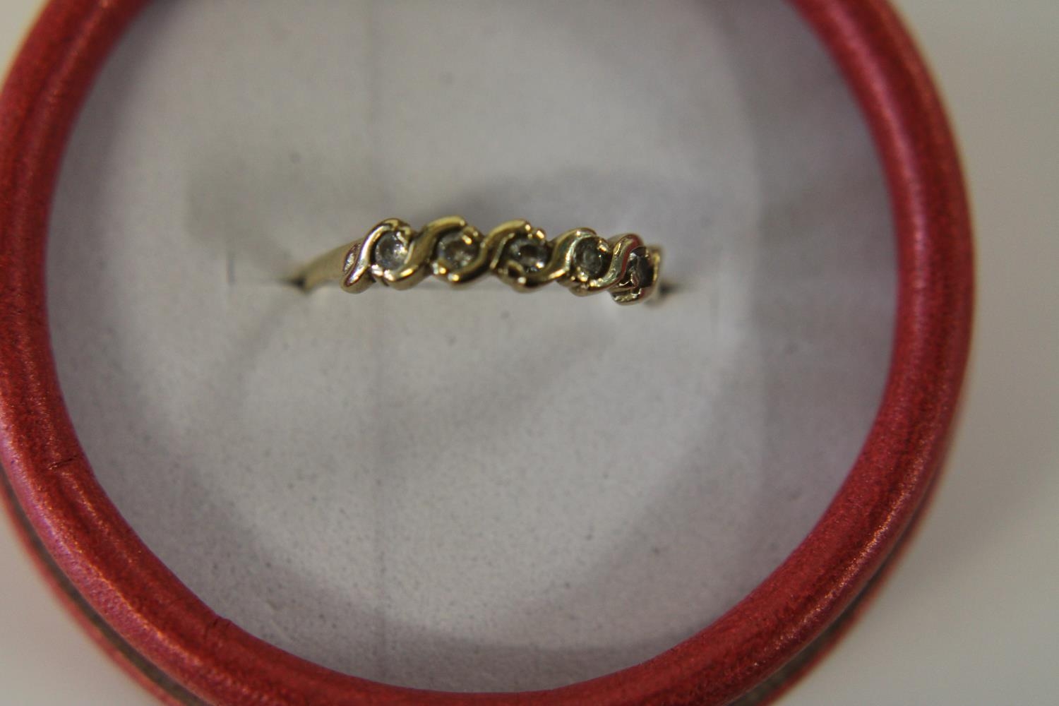 A 9ct gold half eternity ring size P