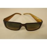 A pair of genuine Christian Dior chunky brown sunglasses