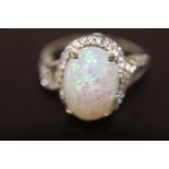 A silver & faux opal ring