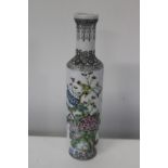 A Chinese Republic bottle vase beautifully decorated with foilage & birds with poem to the rear.