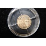 A 24ct gold 2003 Liberia 10 dollar proof coin 0.5 grams