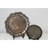 Two Islamic style plates Large plate 33cm in dia. Smaller 20cm in dia