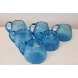 A set of six vintage blue crackle glaze handled glasses