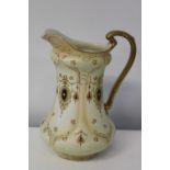 A large Crown Devon jug (Hairline crack)