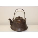 An unusual antique cast kettle with wheatsheaf detail