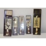 Five pieces of Royal Doulton OCR cutlery