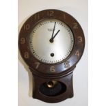 A vintage Smith's bakelite clock (at fault) 26cm in length
