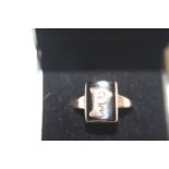 A antique 9ct rose gold & black onyx mourning ring size P