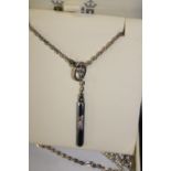 A Royal Mint silver chain & lariat with small diamond